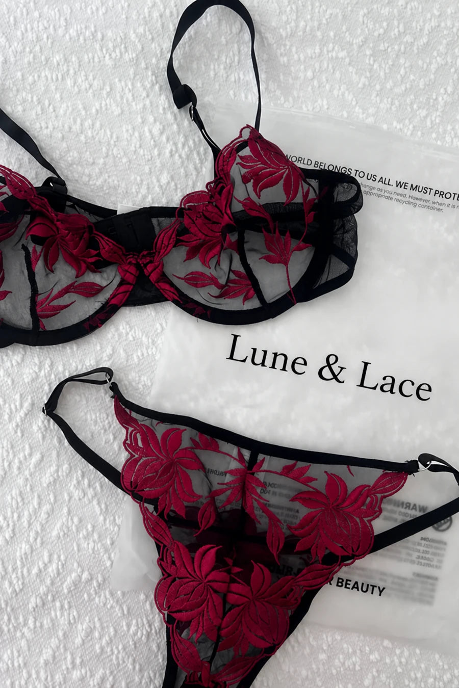 Burgundy embroidered lingerie on Lune & Lace packaging