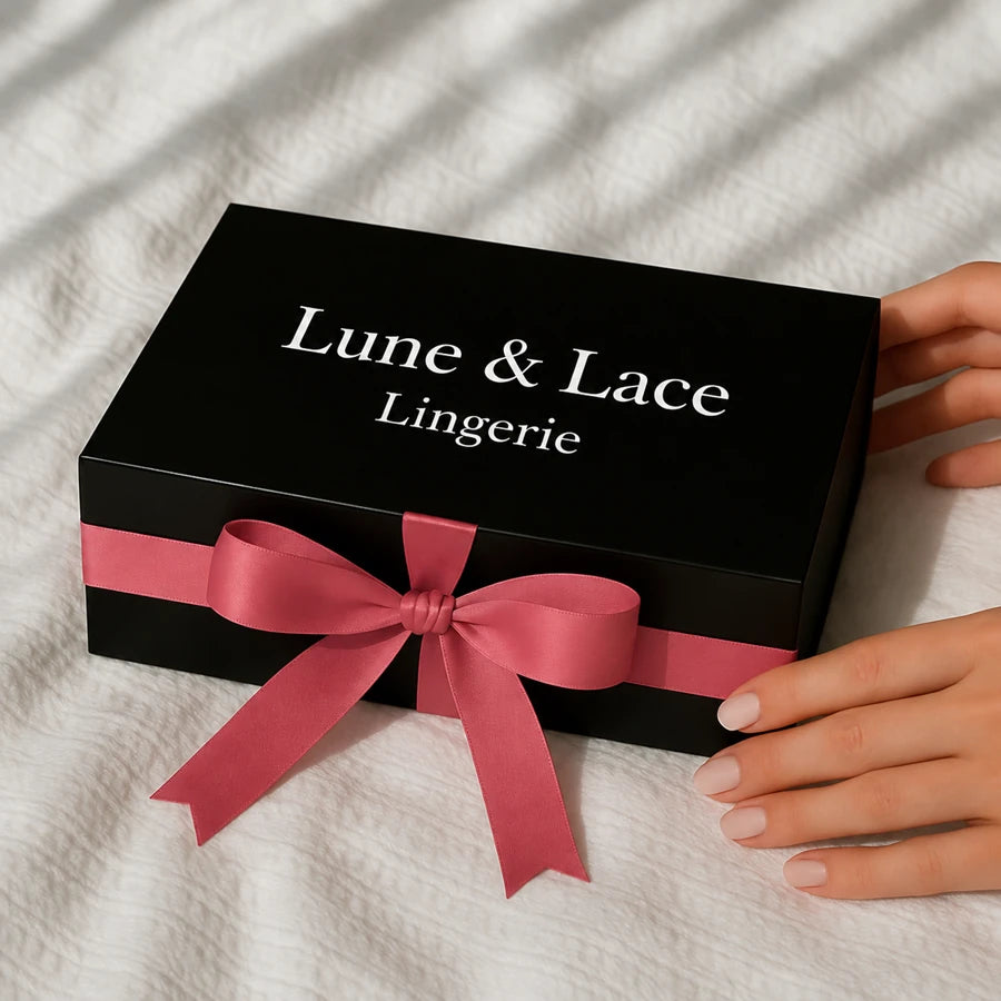 Lune & Lace gift box with a pink ribbon